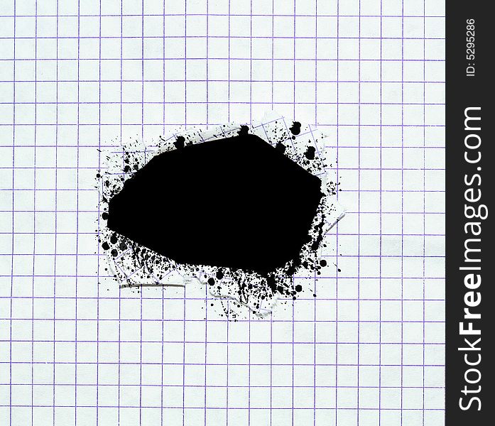 Hole in a paper sheet with inl splatter