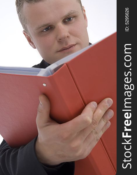 Man with file against a white background. Man with file against a white background