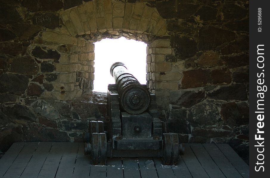 Old Cannon In Front Of The Window