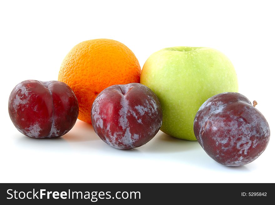 Apple, orange and plums.