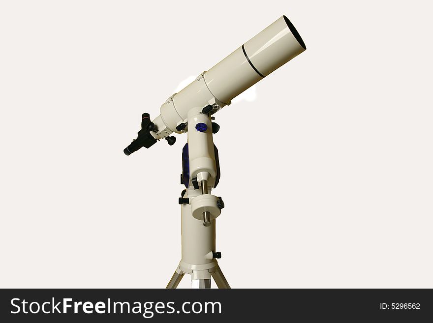 A refractor telescope is attached to a german equatorial mount with tripod. A refractor telescope is attached to a german equatorial mount with tripod.