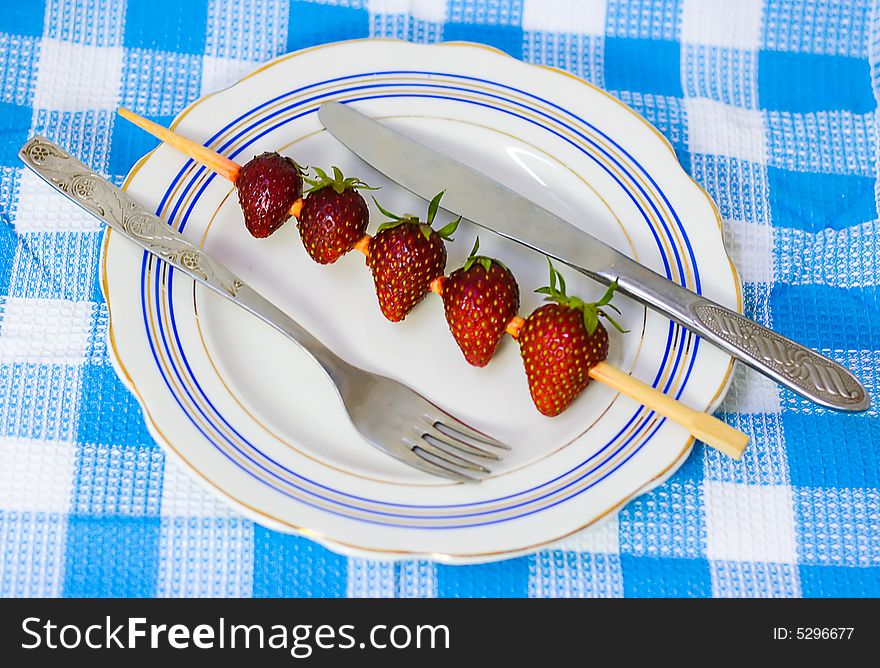 Strawberry barbecue on plate for your design