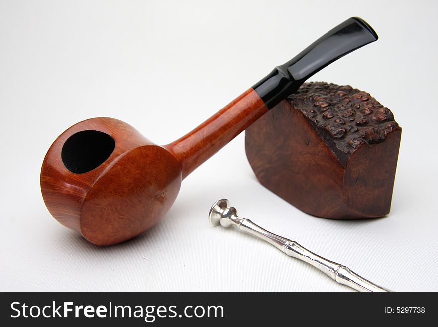 An tobacco pipe isolated on white background.