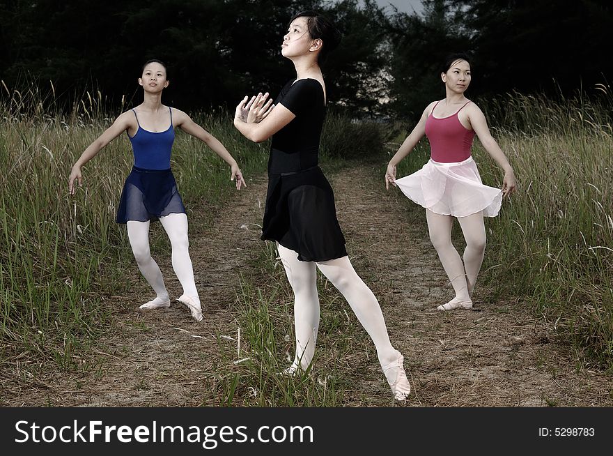 Ballerinas performing in the outdoors. Ballerinas performing in the outdoors