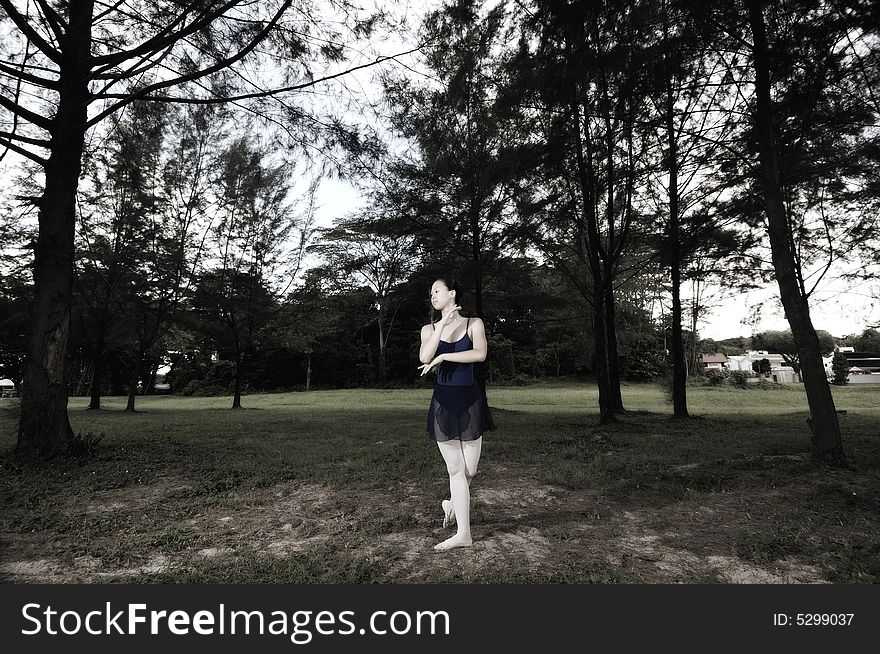 Ballerina performing in the outdoor. Ballerina performing in the outdoor