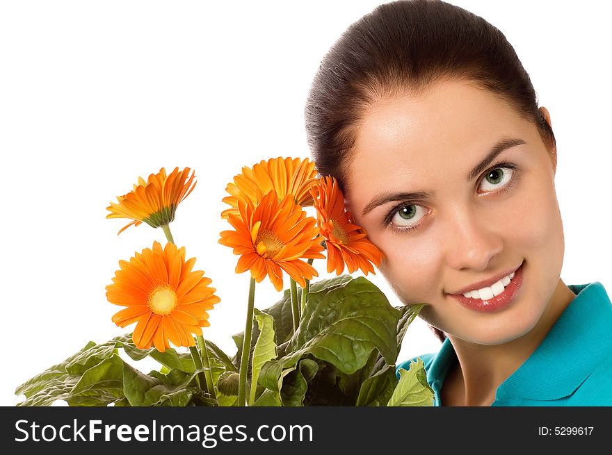 Young smiling woman with gerber flowers (isolated on white)