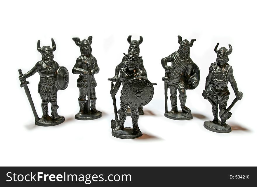 A miniature sculpture of ancient warriors. A miniature sculpture of ancient warriors