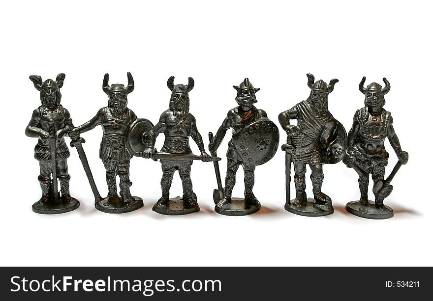 A miniature sculpture of ancient warriors. A miniature sculpture of ancient warriors