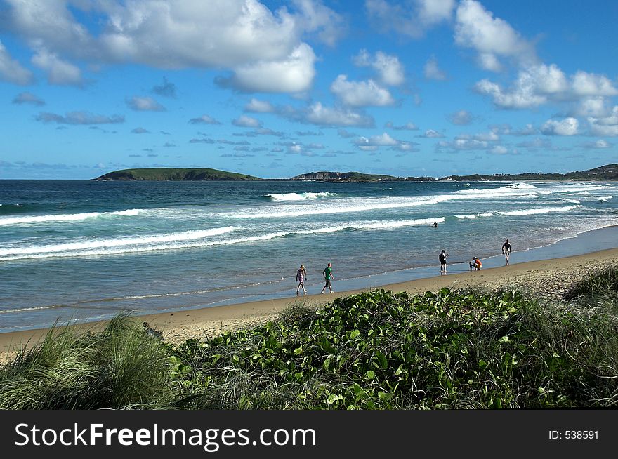 People being active on an Australian beach. People being active on an Australian beach