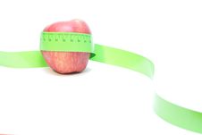 Red Apple Wrapped In A Measuring Tape Stock Photos