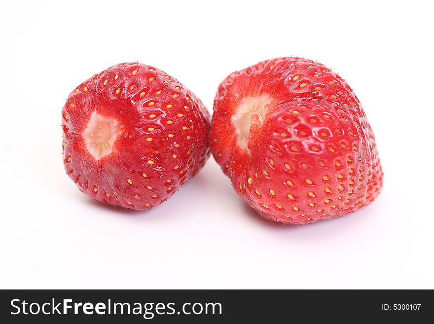 Two sweet strawberry on white background