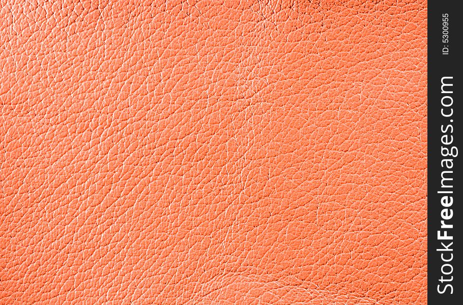 Natural qualitative orange leather texture. Close up. Natural qualitative orange leather texture. Close up.