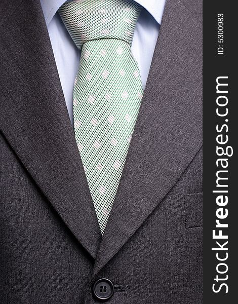 Detail of a suit and a tie, isolated. Detail of a suit and a tie, isolated