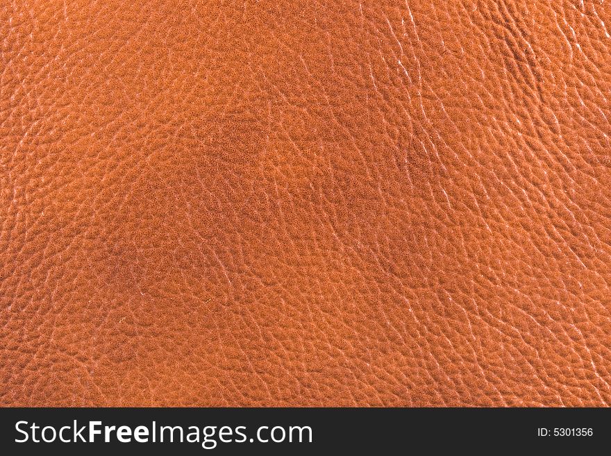 Natural qualitative brown leather texture. Close up. Natural qualitative brown leather texture. Close up.