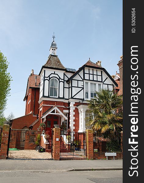 Old Victorian Gothic style house with a mock bell tower