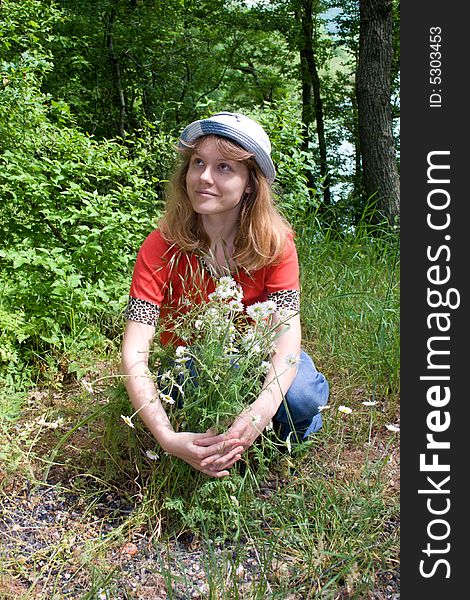 The young girl with camomiles