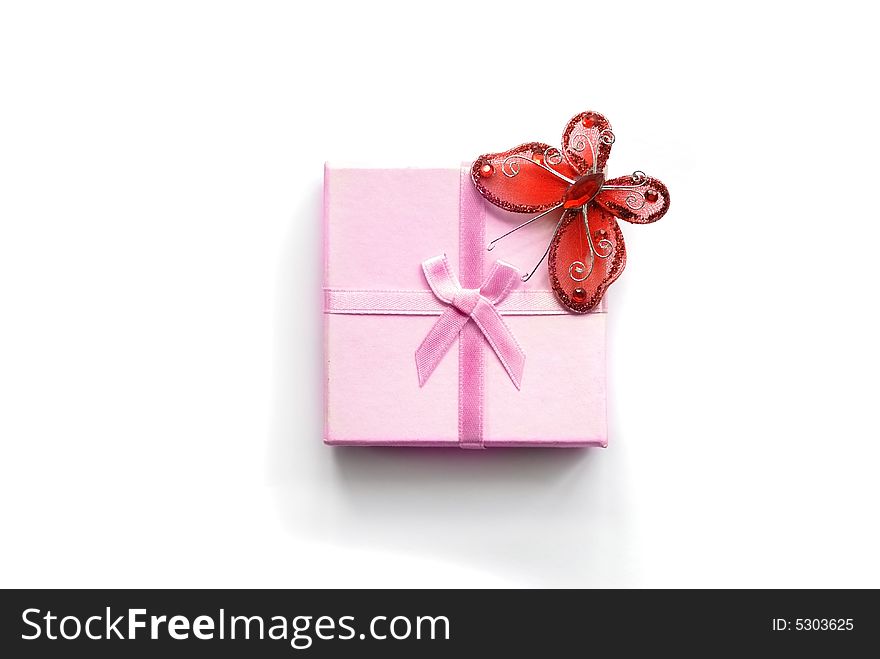 Gift with butterfly isolated on white background