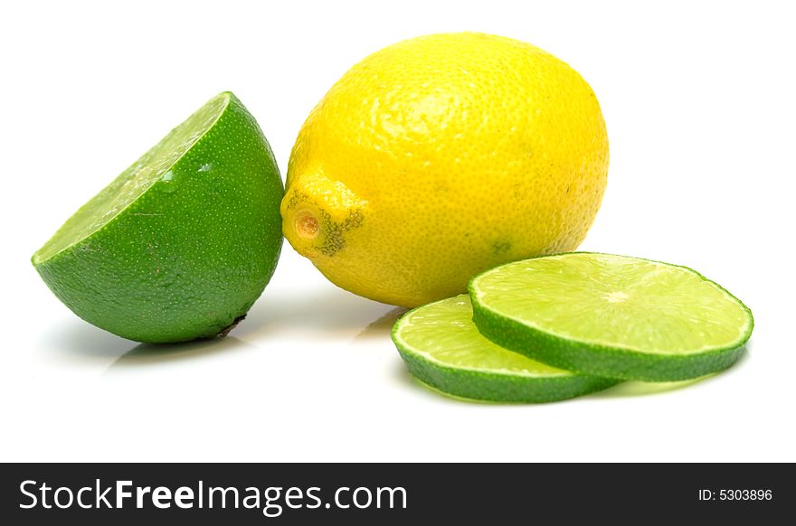 Lemon and segments of lime. Isolation, shallow DOF. Lemon and segments of lime. Isolation, shallow DOF.