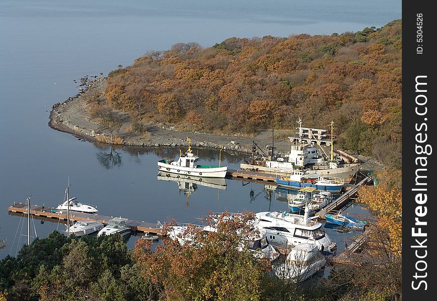 Bay in Black sea with sailboat.