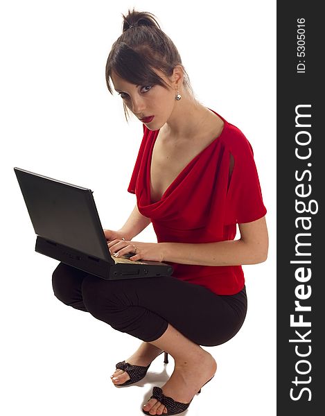 Young pretty woman with laptop on white backgrounds. Young pretty woman with laptop on white backgrounds
