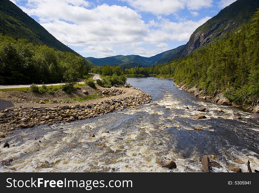 Beautiful landscape with mountains river and forest