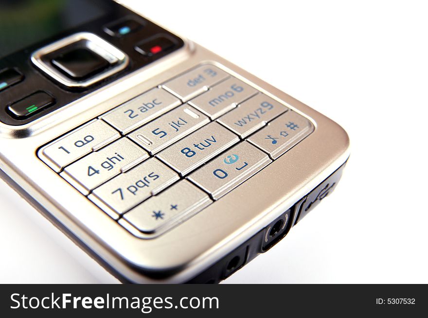 Modern silver mobile phone close-up isolated