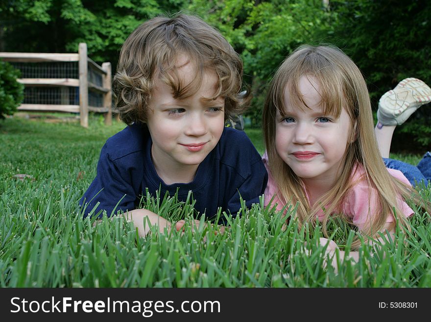 2 Kids In The Grass