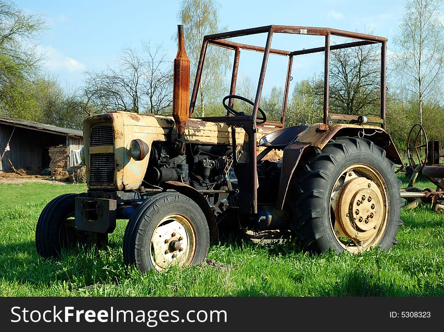 An old tractor in a village, Eastern Europe, spring 2008