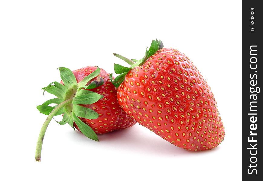 Juicy strawberries isolated over white background, concept of healthy organic, homegrown food and diet.