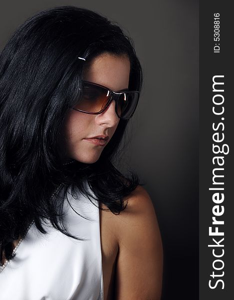 Portrait of hispanic fashion model wearing sunglasses