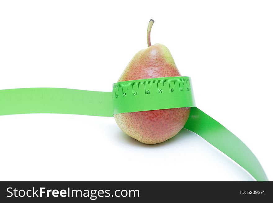 Close-up of a red pear with a measuring tape around it. Close-up of a red pear with a measuring tape around it.