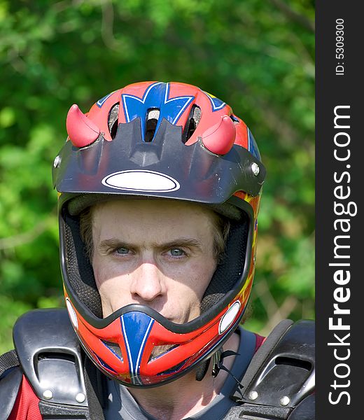 Portrait of downhill rider in the helmet