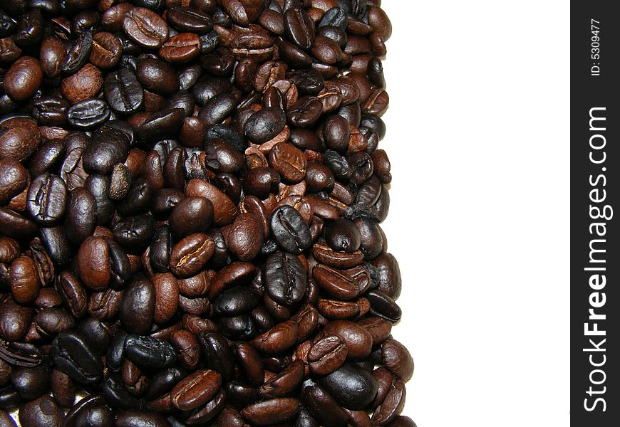 Toasted coffee beans background with copyspace avaliable. Toasted coffee beans background with copyspace avaliable