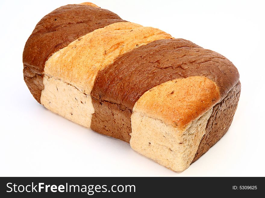 Loaf of marble rye bread over white background.