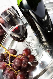 Two Glasses Of Red Wine, The Bottle And Grapes Stock Photo Two Glasses Of Red Wine, The Bottle And Grapes Stock Photo