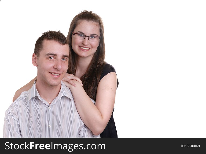 Attractive young couple enjoy an affectionate moment - on white. Attractive young couple enjoy an affectionate moment - on white