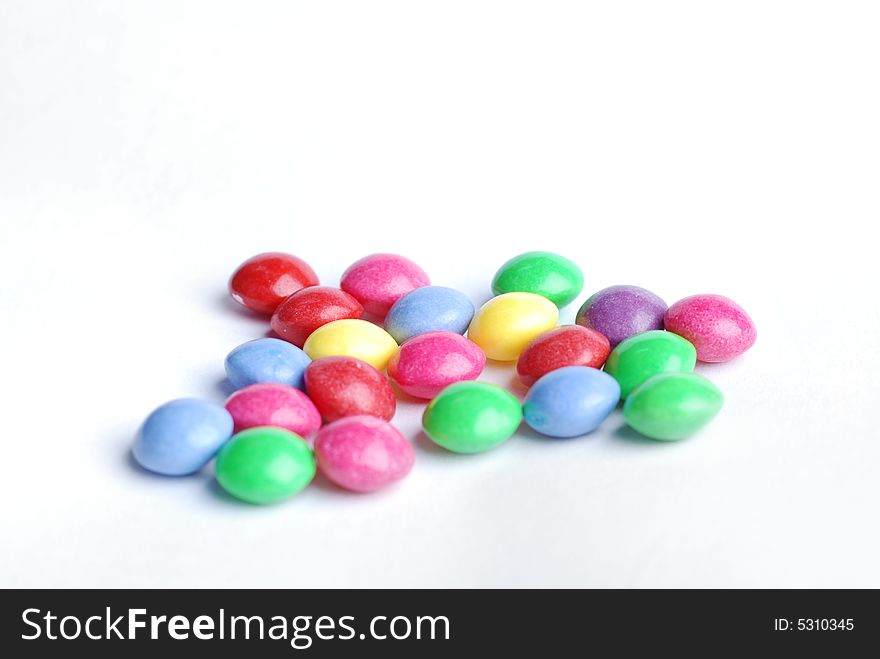 Sweet candy with different colours at white background. Sweet candy with different colours at white background