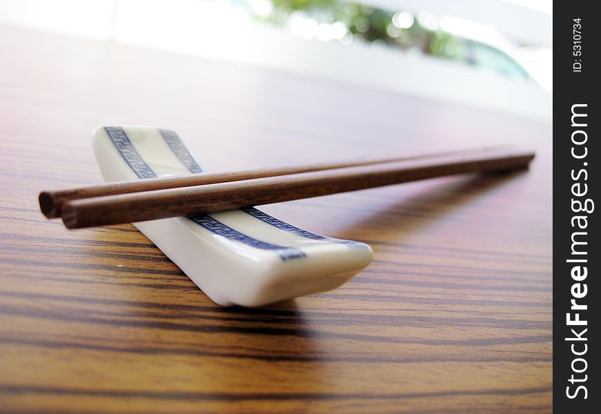 Close up for a pair of wooden chopstick, Chinese culture tools for eating