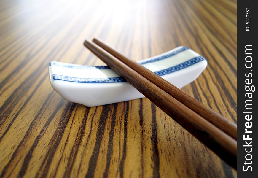 Close up for a pair of wooden chopstick, chinese culture tools for eating