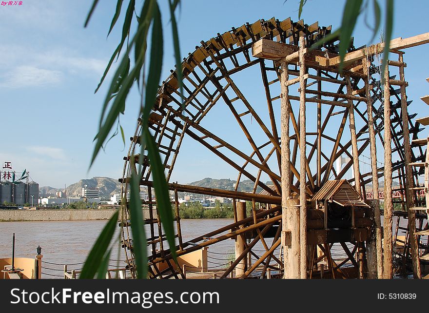 A windmill with Huanghe River nearby,taken in Lanzhou,Gusu,China