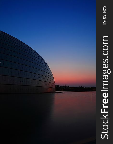 Sunset with The National Grand Theater in Beijing