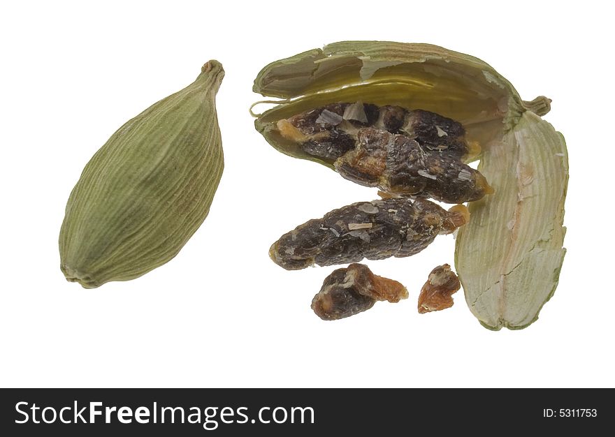 Split cardamom pod showing seeds