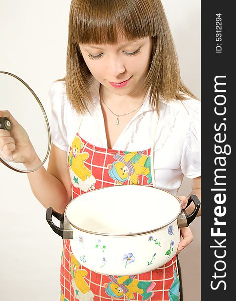 Girl with empty pan smiling