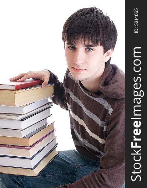 The young student with the books isolated on a white background