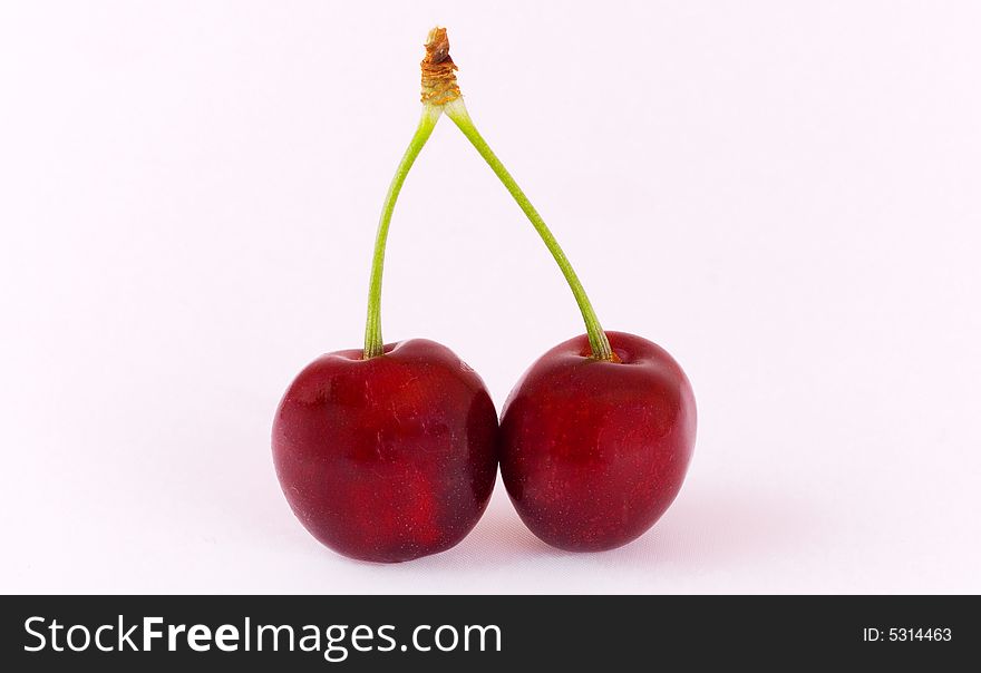 A cherry on the white background