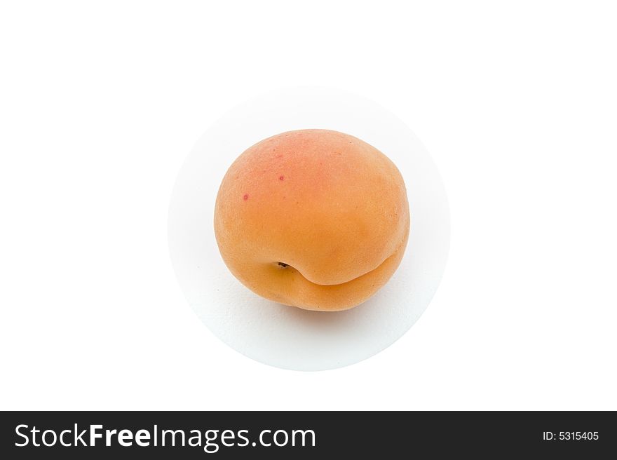 Single apricot isolated on white