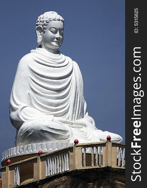 Huge statue of buddha made from white marble