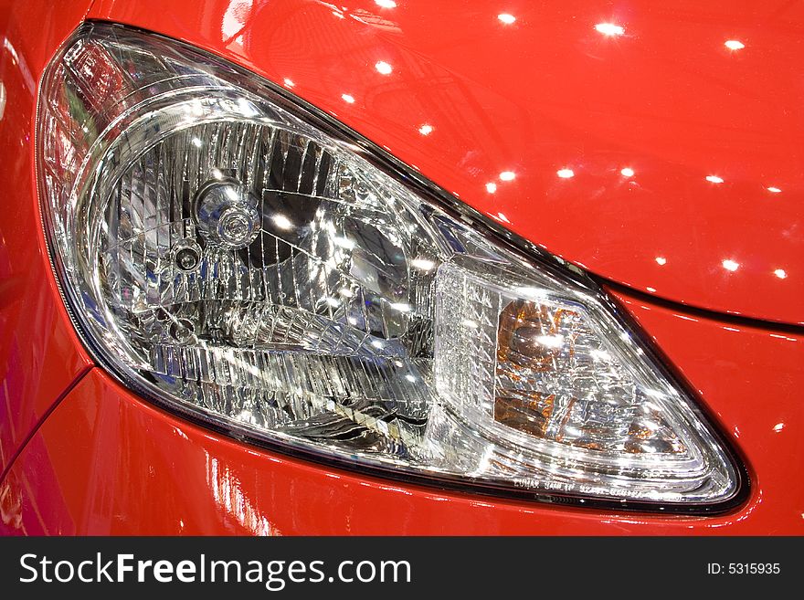 Head Lamp Of Red Car