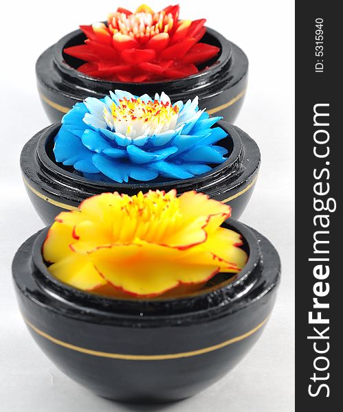 Flower soap carving in vibrant primary colours. Flower soap carving in vibrant primary colours