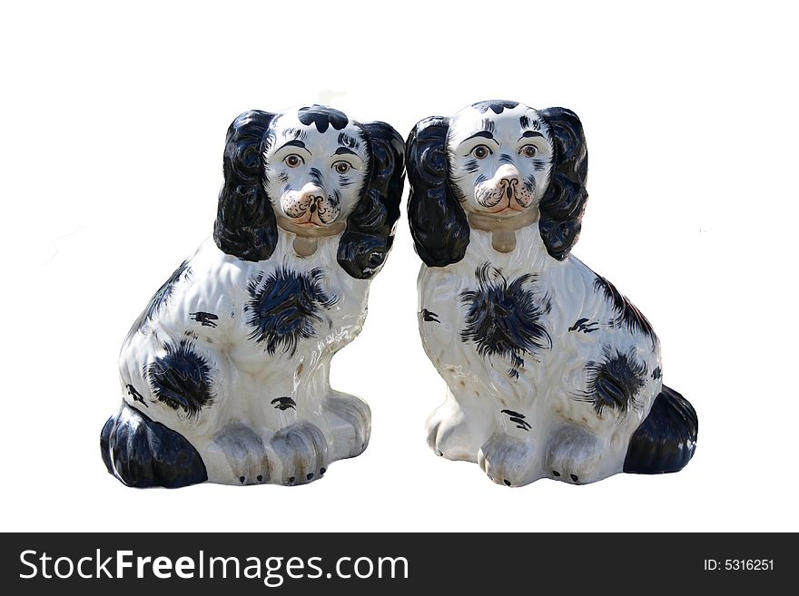 A pair of classic china dogs isolated against a white background